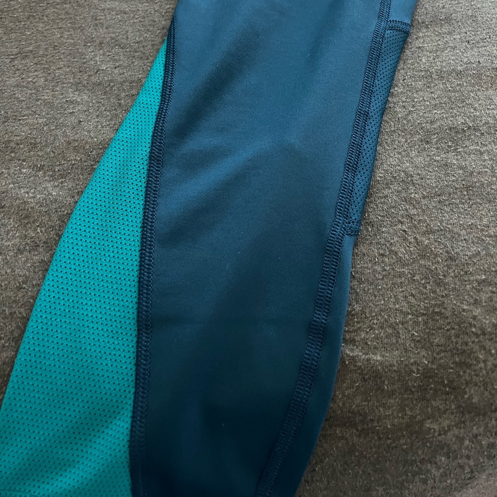 Brand new teal/ running capris dri-fit